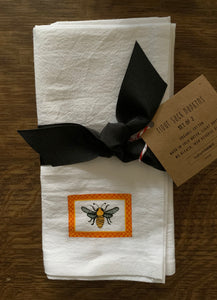 bee in french border napkin